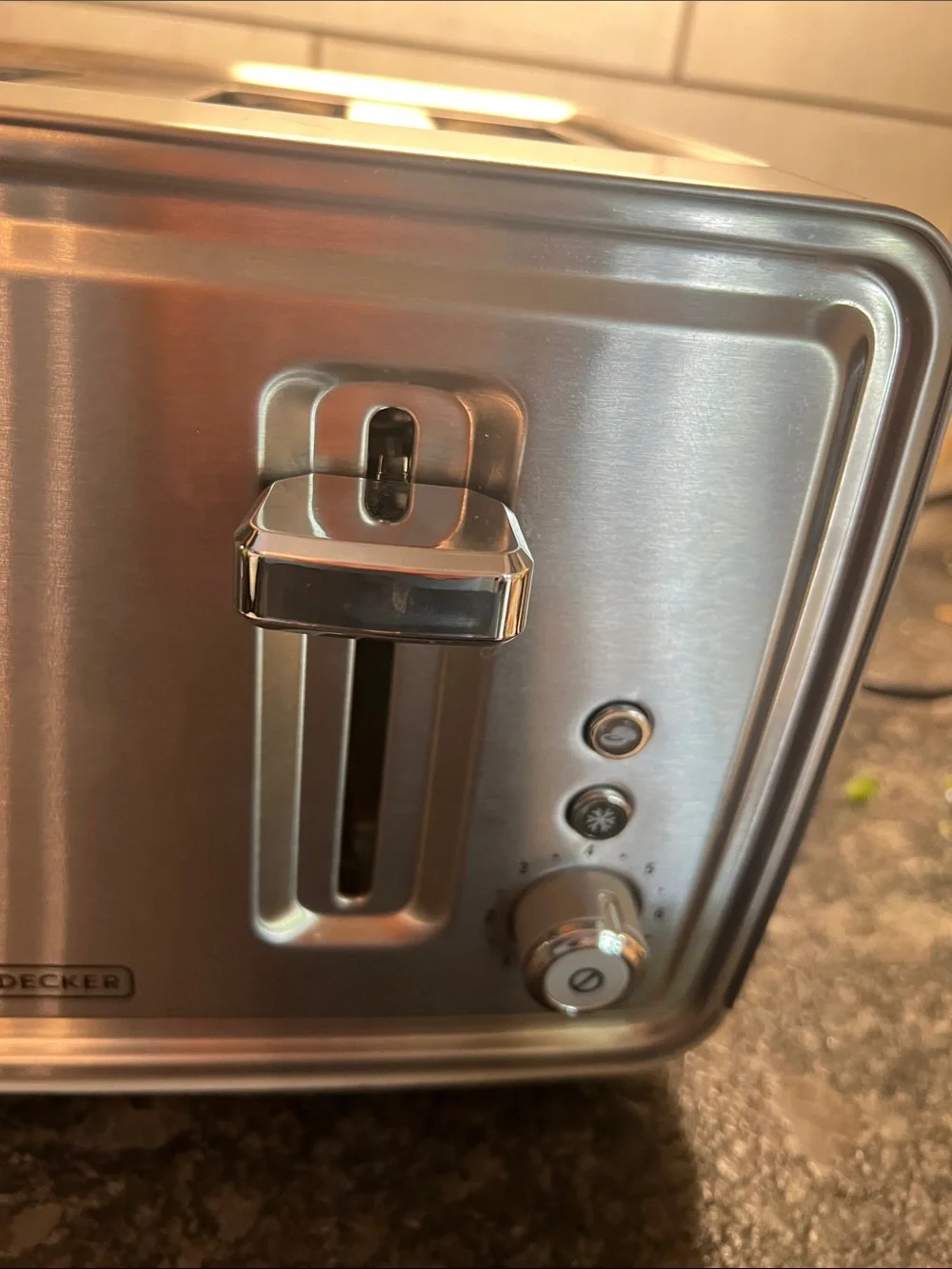 Wide 4 Slot Black and Decker Stainless toaster. Like new.